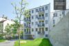 Neuwertige Dachgeschoss-Wohnung mit Balkon, per Aufzug bequem zu erreichen - Fassade Hofseite